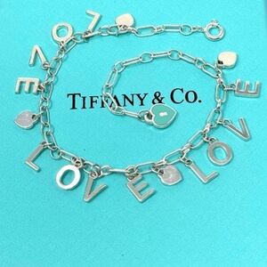 Authentic Tiffany & co. Love Notes Charm Bracelet.